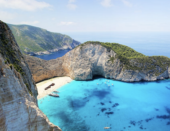 Vibrant blue coastline Greece emigration for Canadians is the move